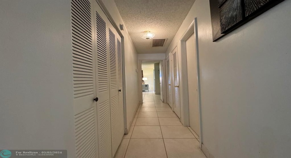 FOYER TO BEDROOM