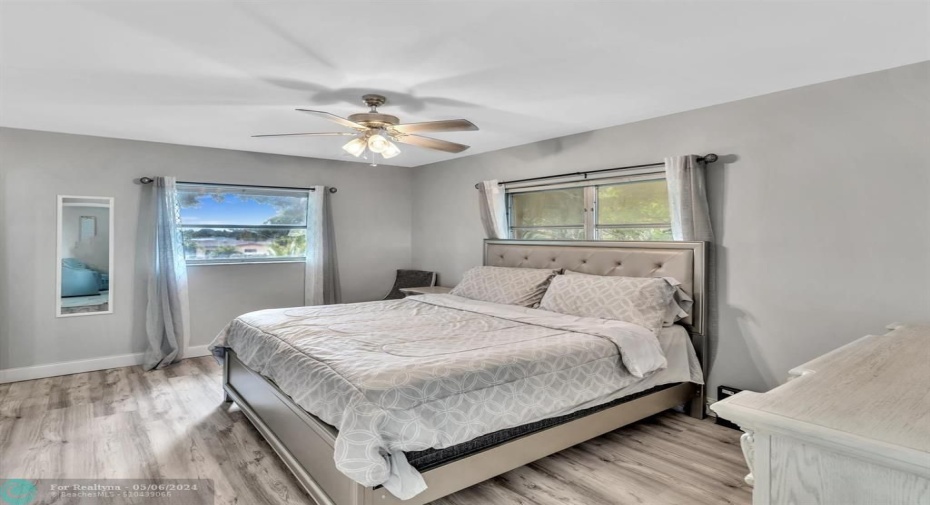 Gorgeous Master Bedroom with Double Windows