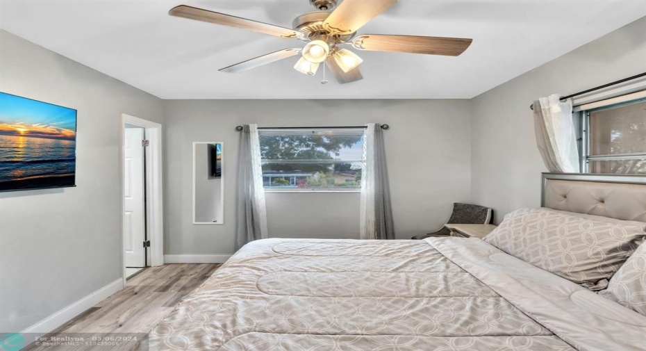 Gorgeous Master Bedroom with Double Windows