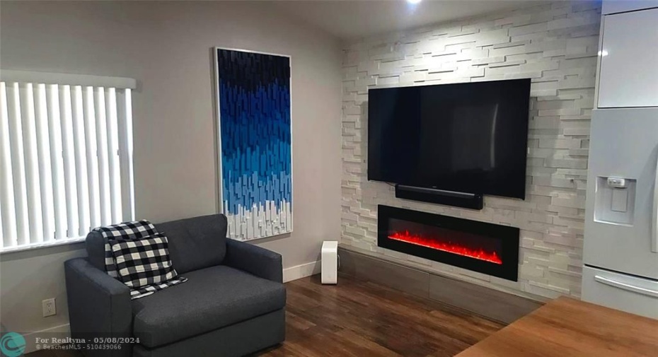 In Wall Decorative Fireplace & Attached Custom Cabinetry