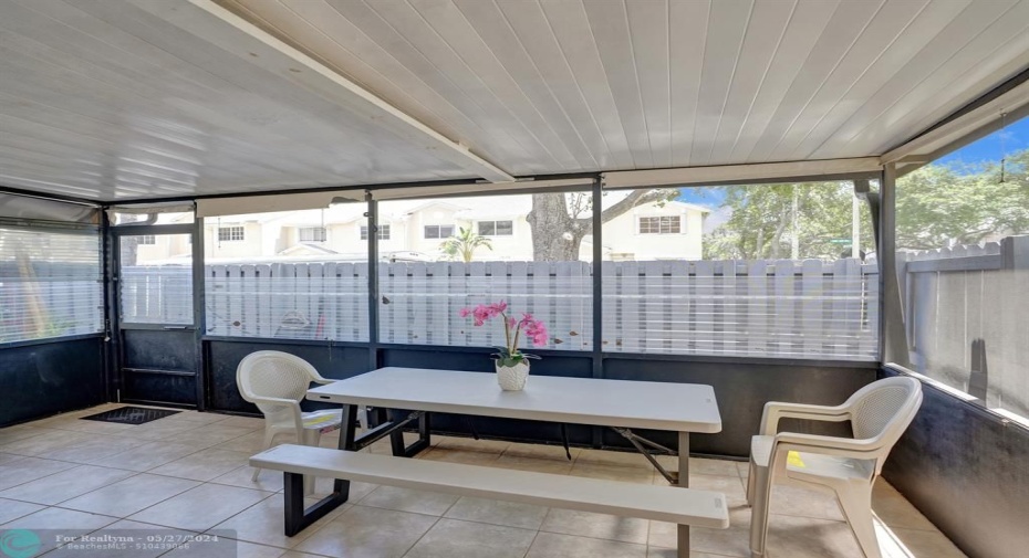 Covered & screened patio...