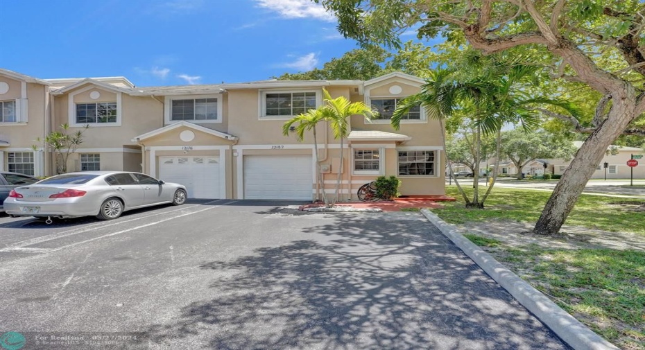 Entire house has accordian hurricane shutters & impact garage door.