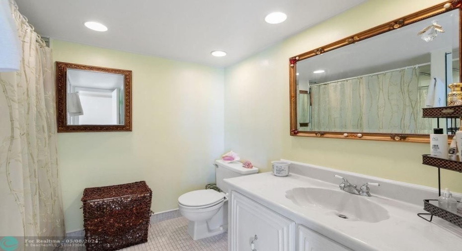 Full bathroom with tub.