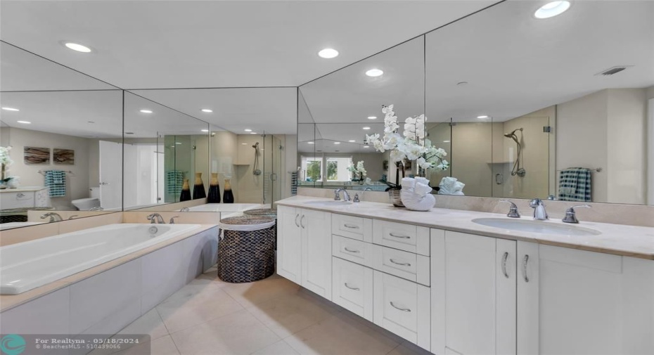 Master Bath Features Dual Vanities and Recessed Lighting
