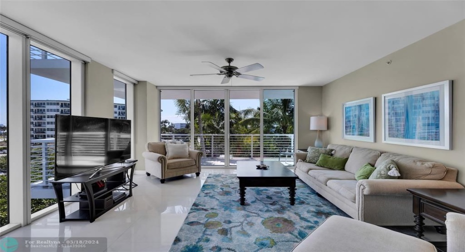 Walls of Impact Glass and Custom Blinds