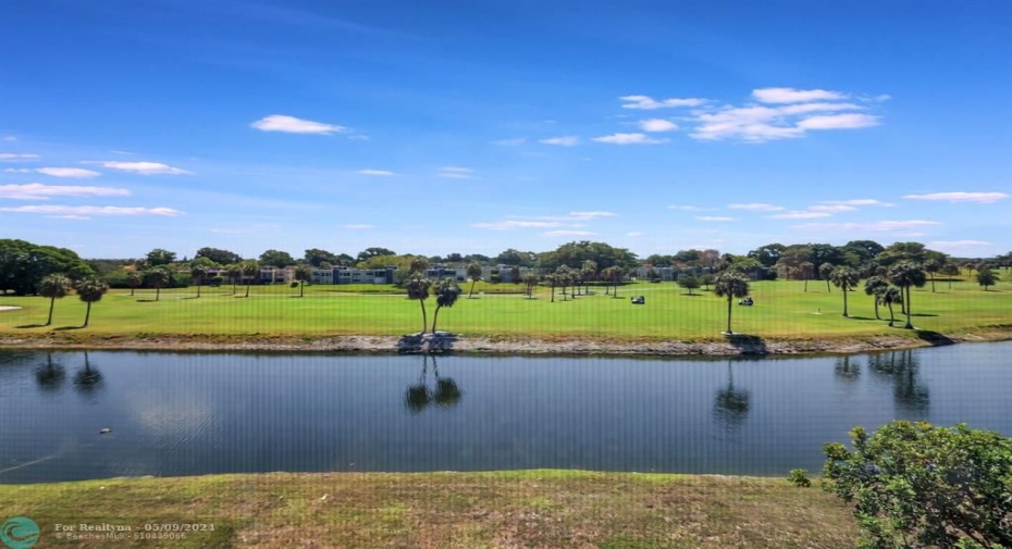 PUBLIC GOLF COURSE, LAKE FRONT, CONDO ASSOCIATION OWNS THE LAKE.