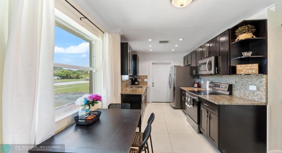 Charming Updated Pool Home in the desirable Fairlawn area with NO HOA. This great floor plan offers a 3 bedroom split floorplan, 2 Bathrooms, Amazing backyard with private pool and outdoor space for the kids to play or adults to entertain. Just minutes to the Deerfield Beach, Pier, and Attractions. Modern updates throughout with a cozy home vibe.