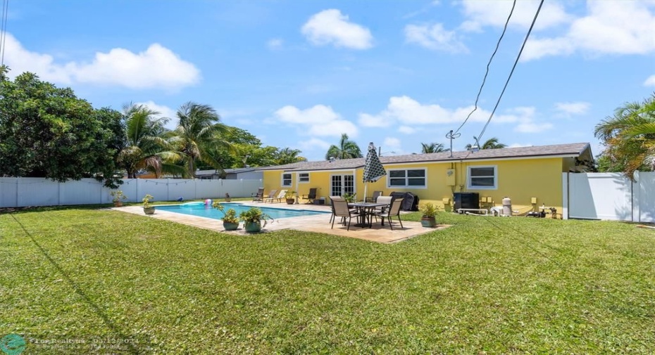 Charming Updated Pool Home in the desirable Fairlawn area with NO HOA. This great floor plan offers a 3 bedroom split floorplan, 2 Bathrooms, Amazing backyard with private pool and outdoor space for the kids to play or adults to entertain. Just minutes to the Deerfield Beach, Pier, and Attractions. Modern updates throughout with a cozy home vibe.