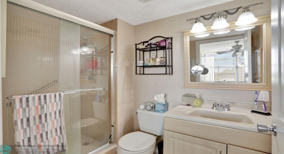 MASTER BATHROOM FLOOR TILE REPLACED, COMMODE, VANITY, MIRROR AND LIGHT FIXTURE ALL REPLACED.