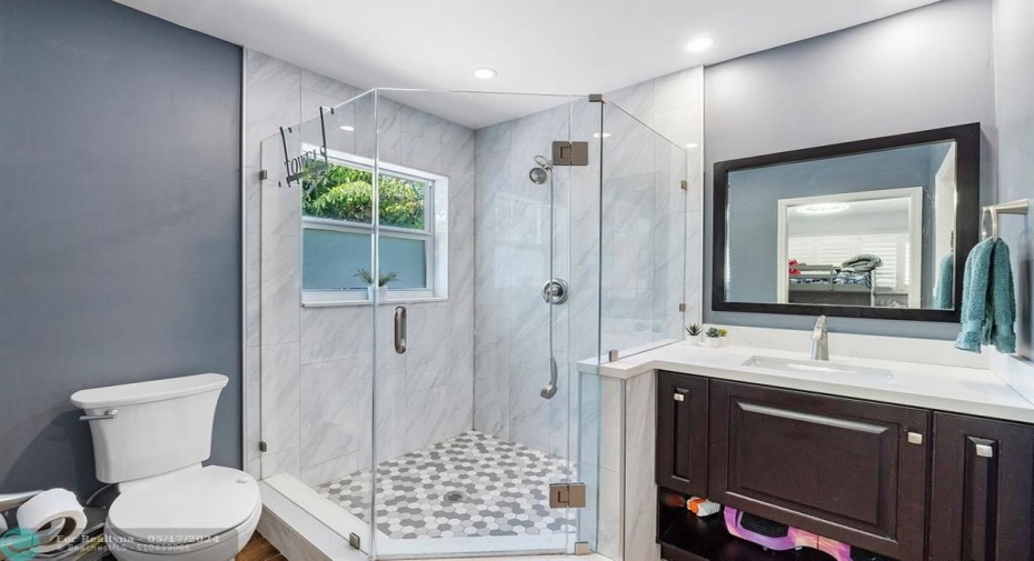 Renovated 'jack and jill' bath for guests and second bedroom!