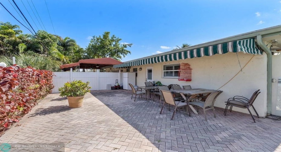 Privacy fence and turf surrounds this HUGE outdoor area!