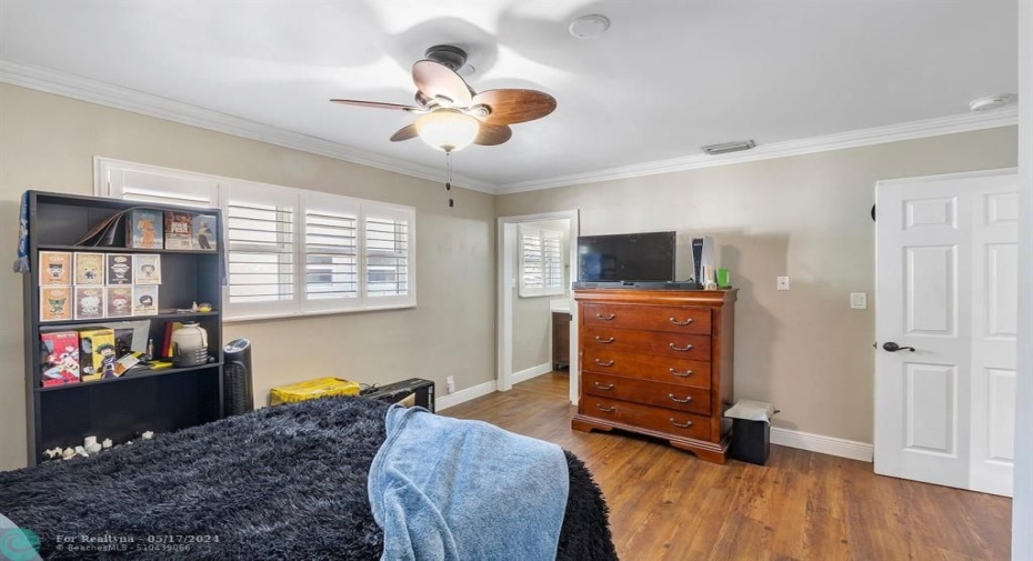 Guest bedroom ensuite features crown molding!