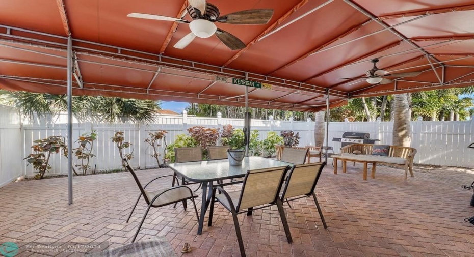 Brick pavers and privacy fence make for the perfect backyard space!