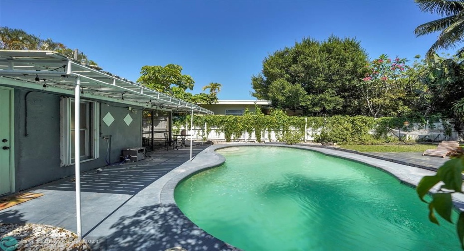 BACK YARD - VIEW OF POOL FROM WEST SIDE OF HOME.