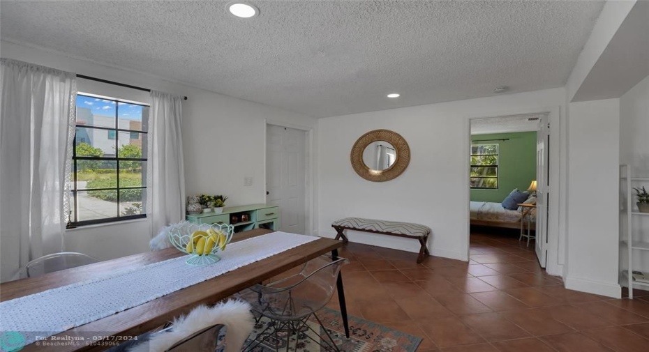 DINING AREA/ENTRANCE TO FRONT OF HOME/2ND BEDROOM