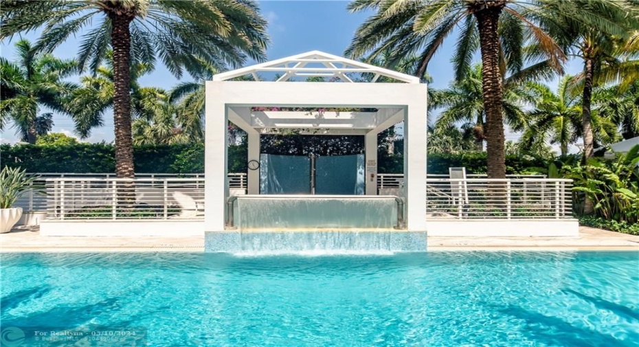 25 meter pool, jacuzzi behind the waterfall