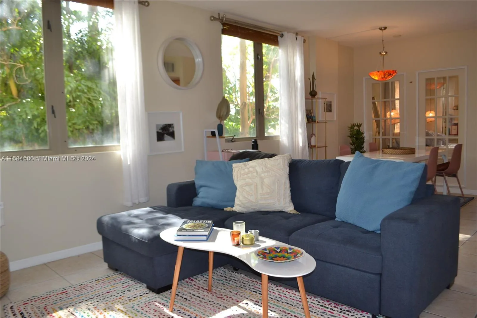 Open concept, bright and spacious corner condo with 1 BR, 1BA, inside laundry and walk-in closet.
