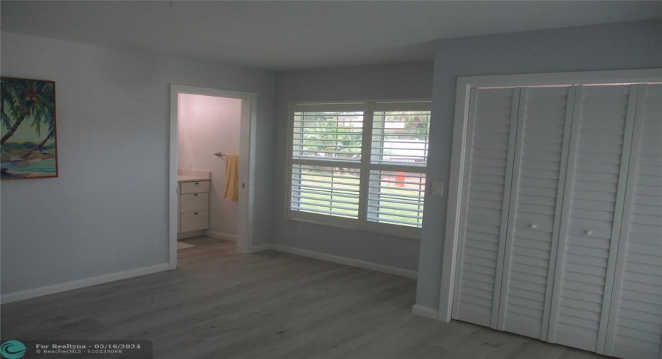 Primary Bedroom second Closet with en suite to the left.