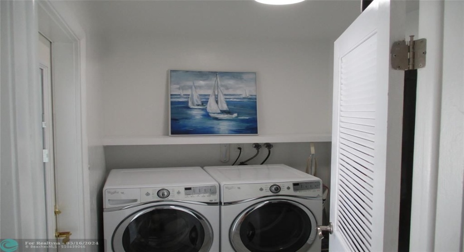 Separate laundry room.