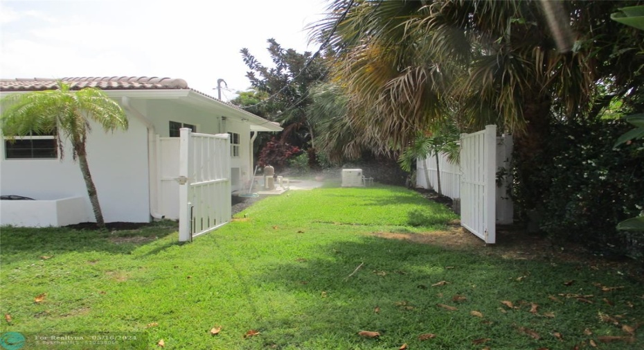 Gated Fence for small boat or camper trailer.