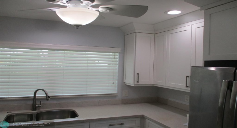 Kitchen has Quartz Countertops.
