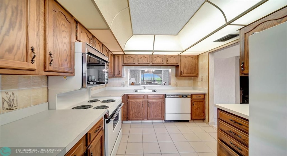 Kitchen With Pass-Through To Dining Room