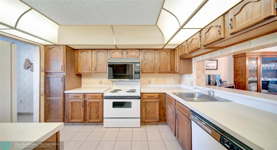 Kitchen With Pass-Through To The Dining Room on right