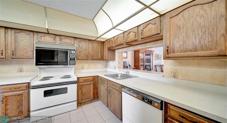 Kitchen With Pass-Through To Dining Room