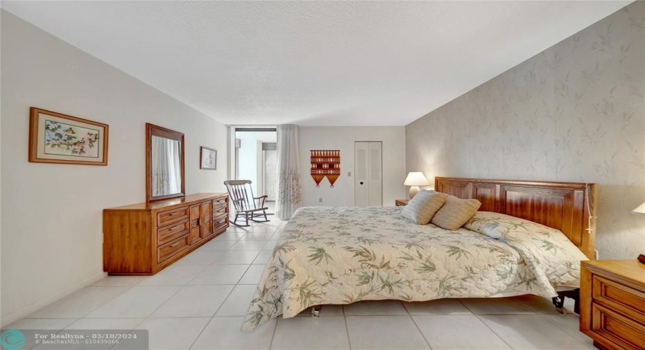Huge Master Bedroom with Patio Door to Screened Balcony