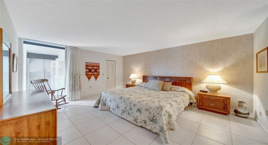 Huge Master Bedroom with Patio Door to Screened Balcony