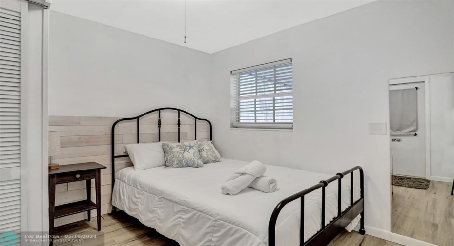 Guest bedroom Number 2 with door to carport