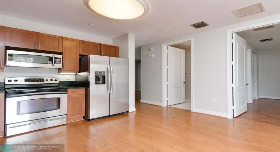 Kitchen with access to all areas in this large full size one bedroom 1 bath.  and separate living room