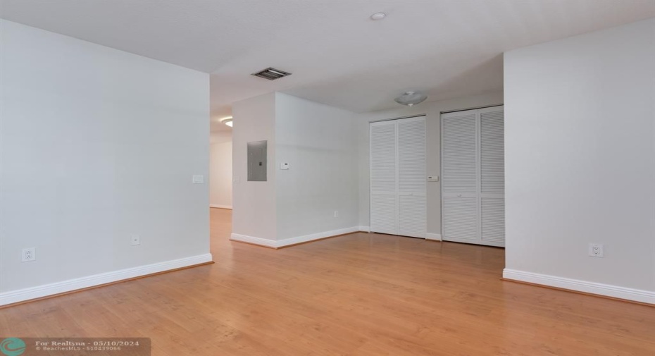 Front entry Living Area/Work-out Area with Laundry closet