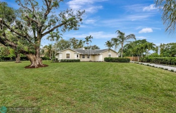 Plenty of open land surrounds this classic home.