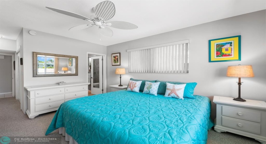 Spacious primary with plenty of light.  His and hers closets.
