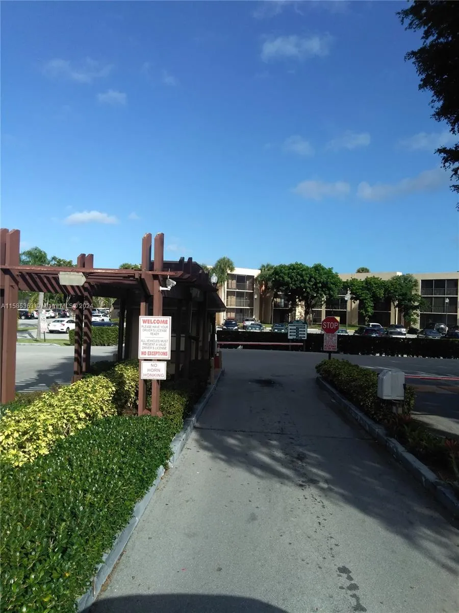 driving into complex, security guard check in