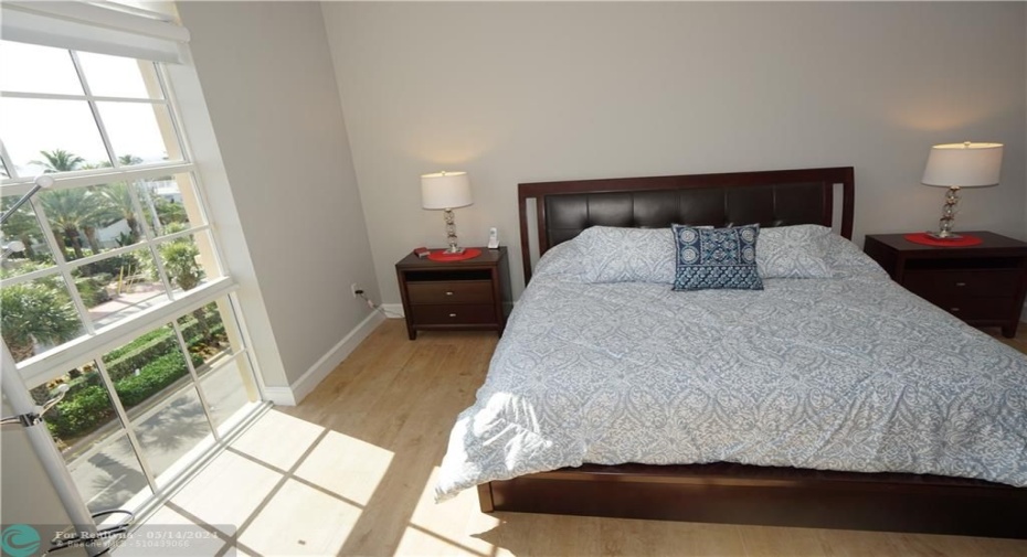 Master Bedroom - 12' Ceiling, Impact Windows, Ceramic Plank Flooring