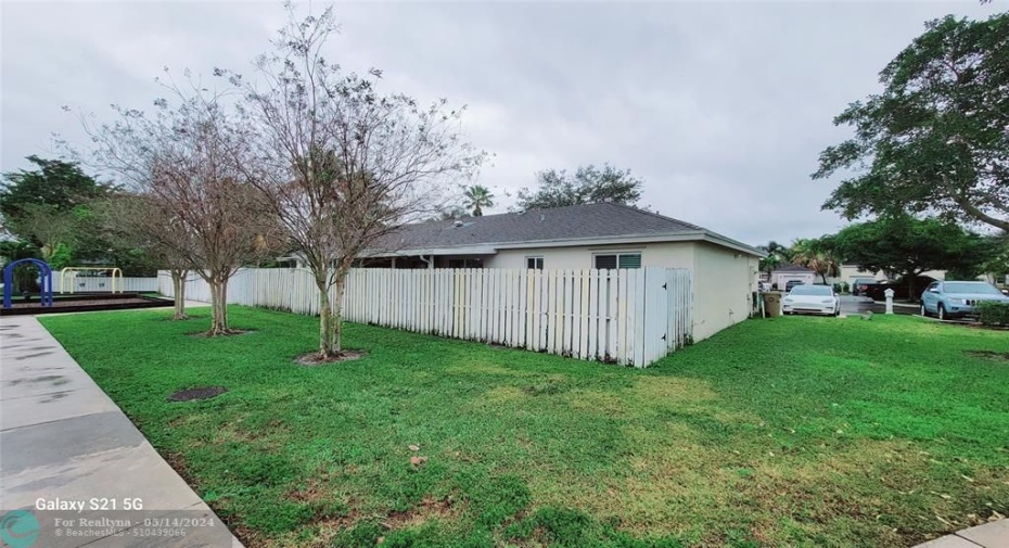 Large Fenced lot with Aluminum Roofed rear patio
