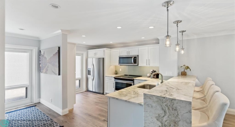 Foyer leading to Fully Renovated Kitchen