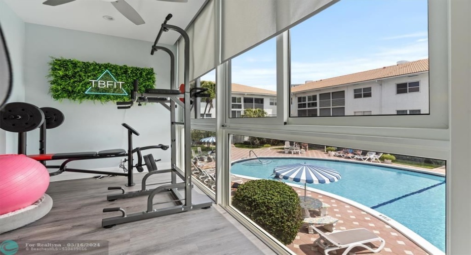 Enclosed Balcony Overlooking Pool