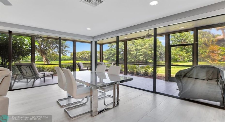 Wrap around sliding doors are equipped with electric blinds.