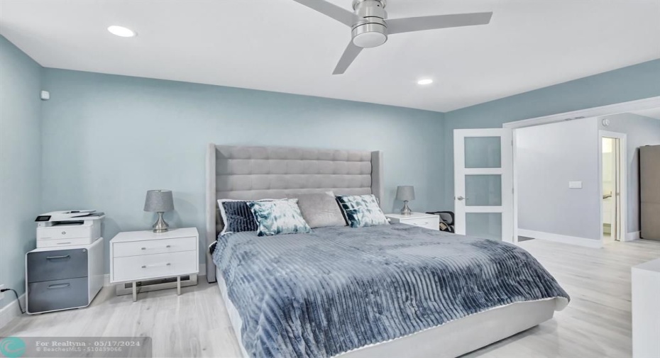 Spacious bedroom w/French door entrance.