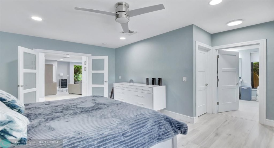 Walk in closet & ensuite bathroom in bedroom.