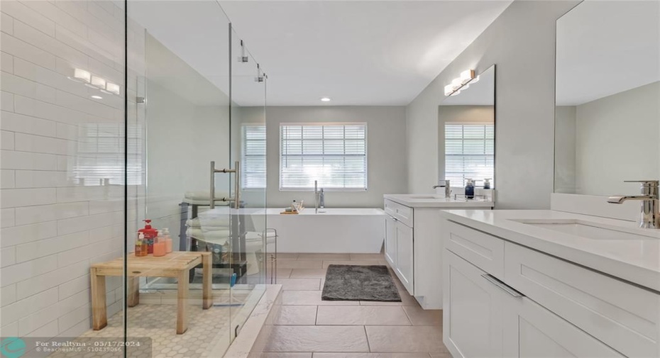 Two Separate Vanities and Sinks, LONG glass enclosed shower and deep long stand alone tub!