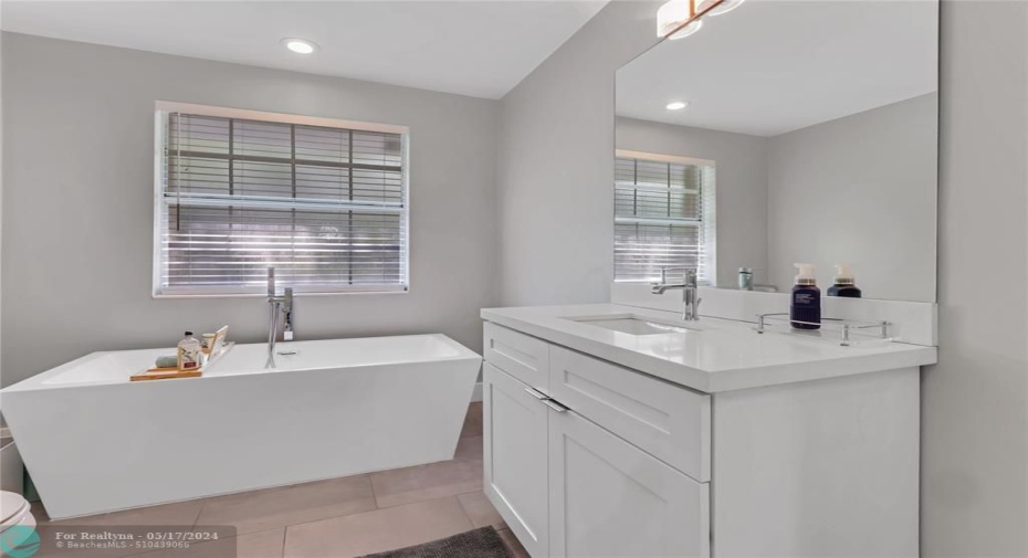 Immerse yourself in your luxurious bathtub....