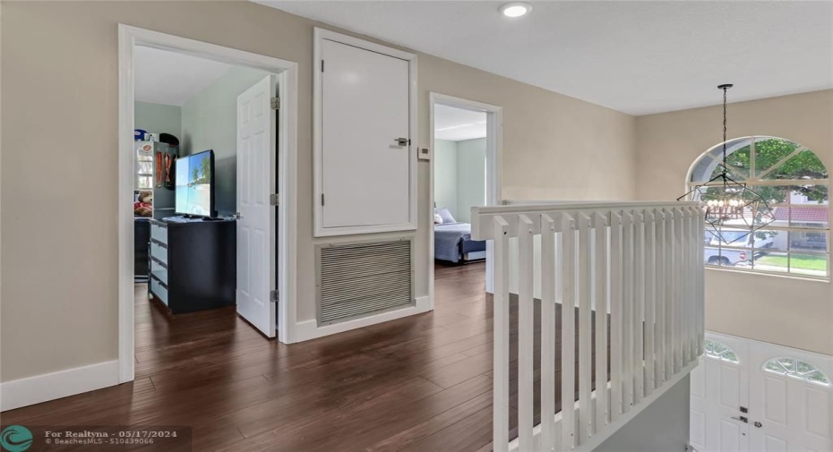 Flowing light hallways to the three EXTRA bedrooms