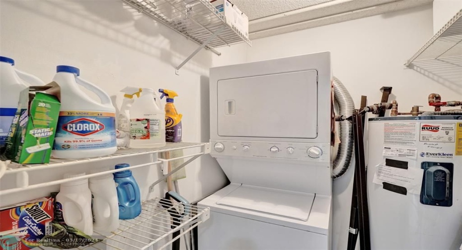 Laundry room w/washer & dryer.