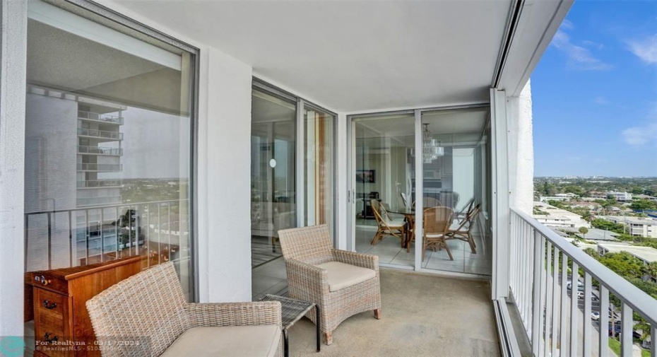 Three sliding doors to the primary suite, the living area and the dining area.