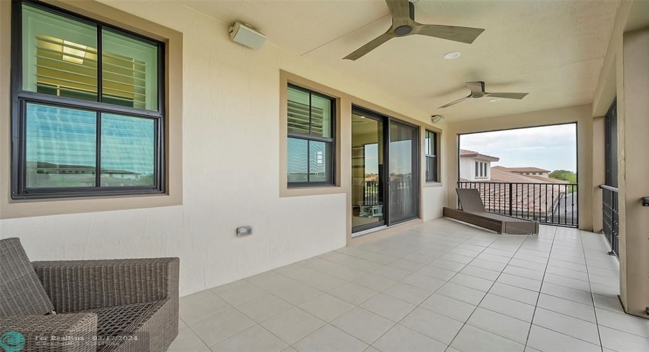 Screened in balcony off of the primary bedroom