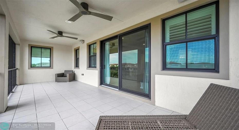 Screened in balcony off of the primary bedroom
